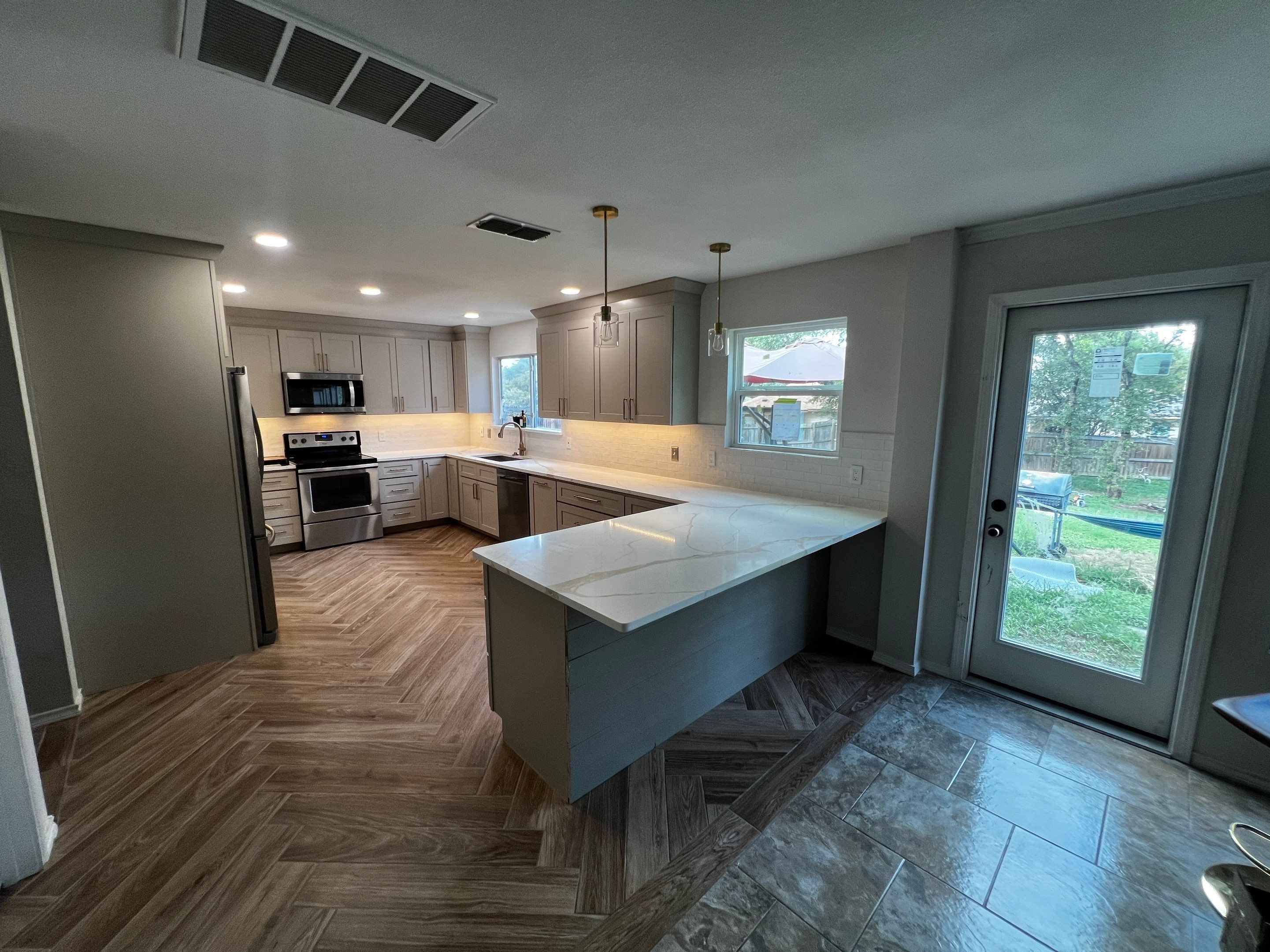 Kitchen with herringbone floor