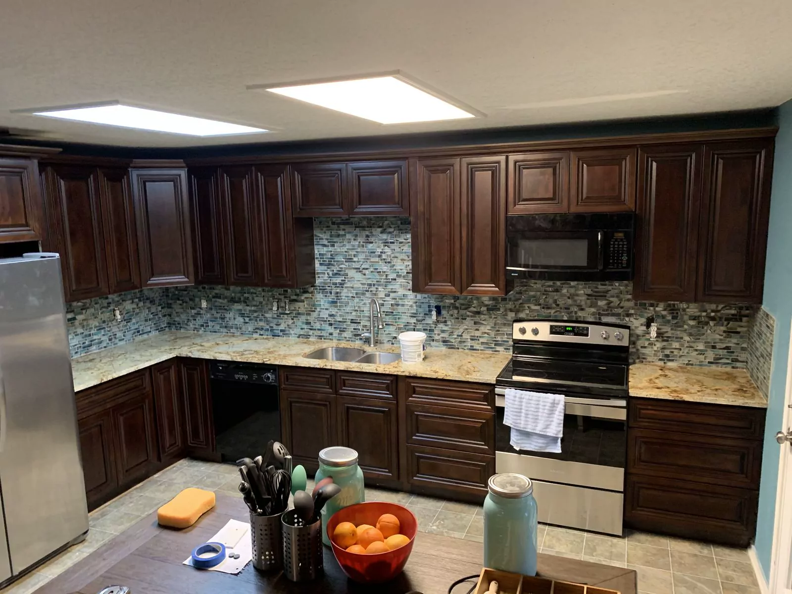 Dark wood kitchen by Flip Fixer