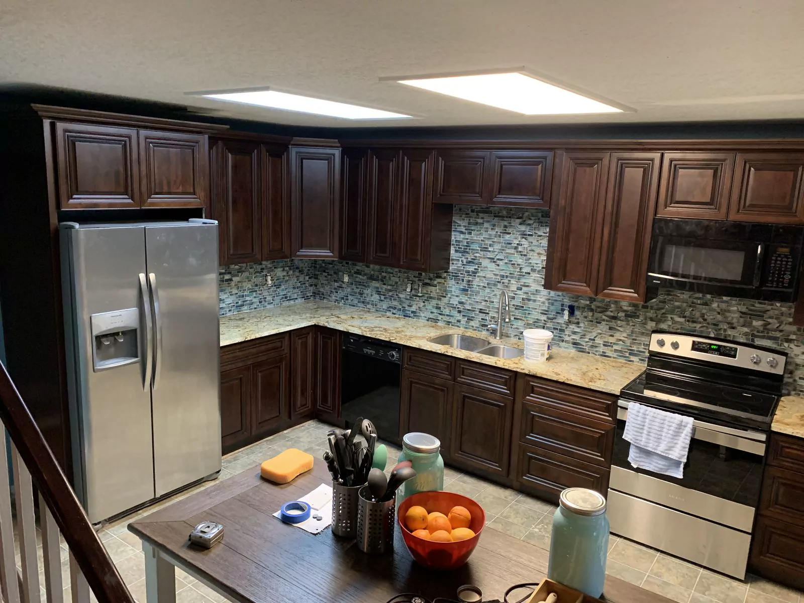 Dark wood kitchen by Flip Fixer