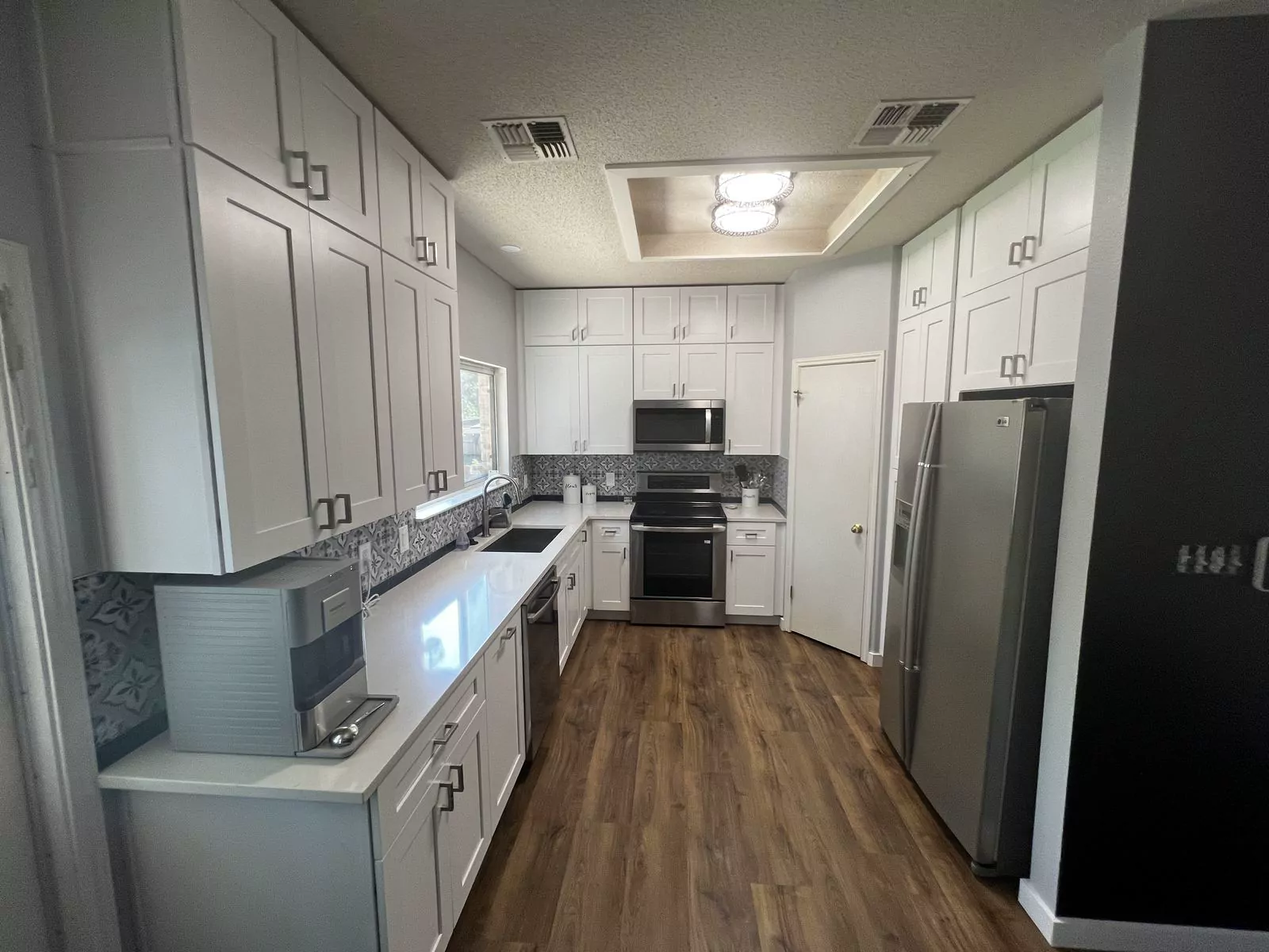 White shaker kitchen by Flip Fixer