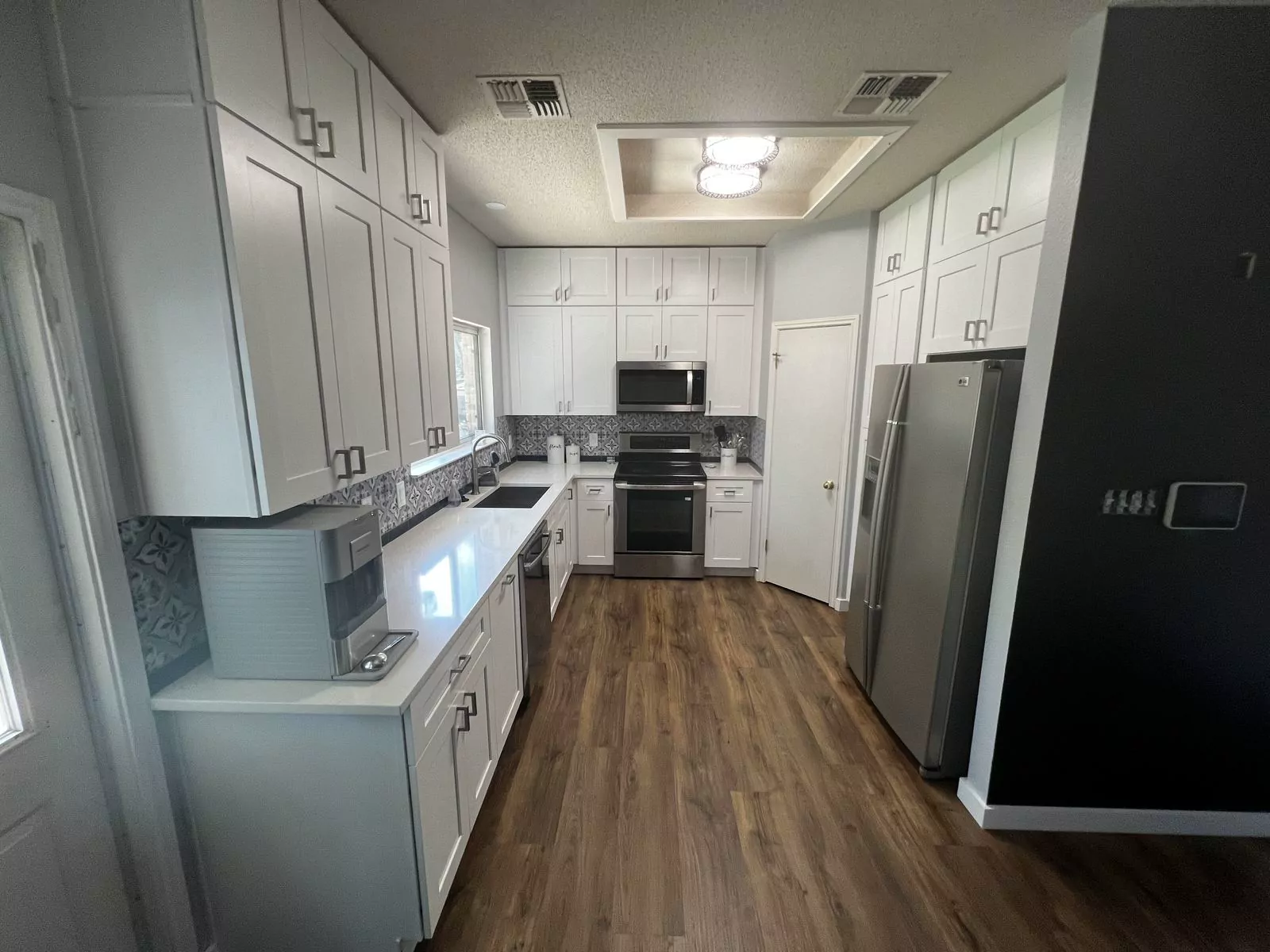 White shaker kitchen by Flip Fixer