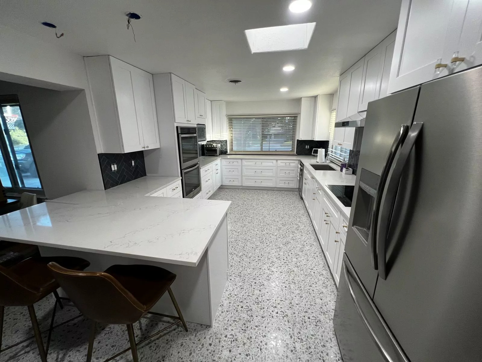 Herringbone kitchen by Flip Fixer
