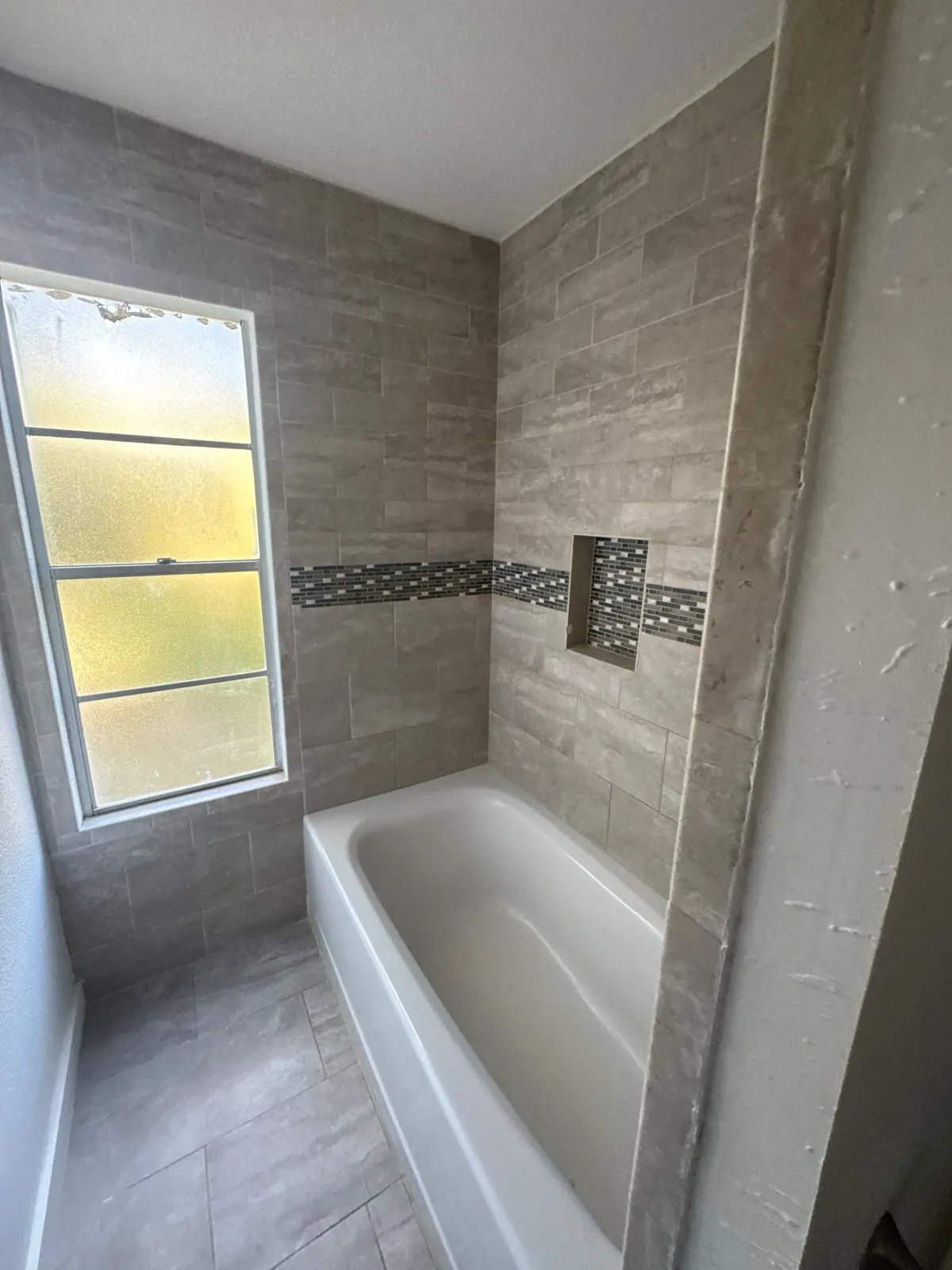 Finished bath after fire rebuild by Flip Fixer