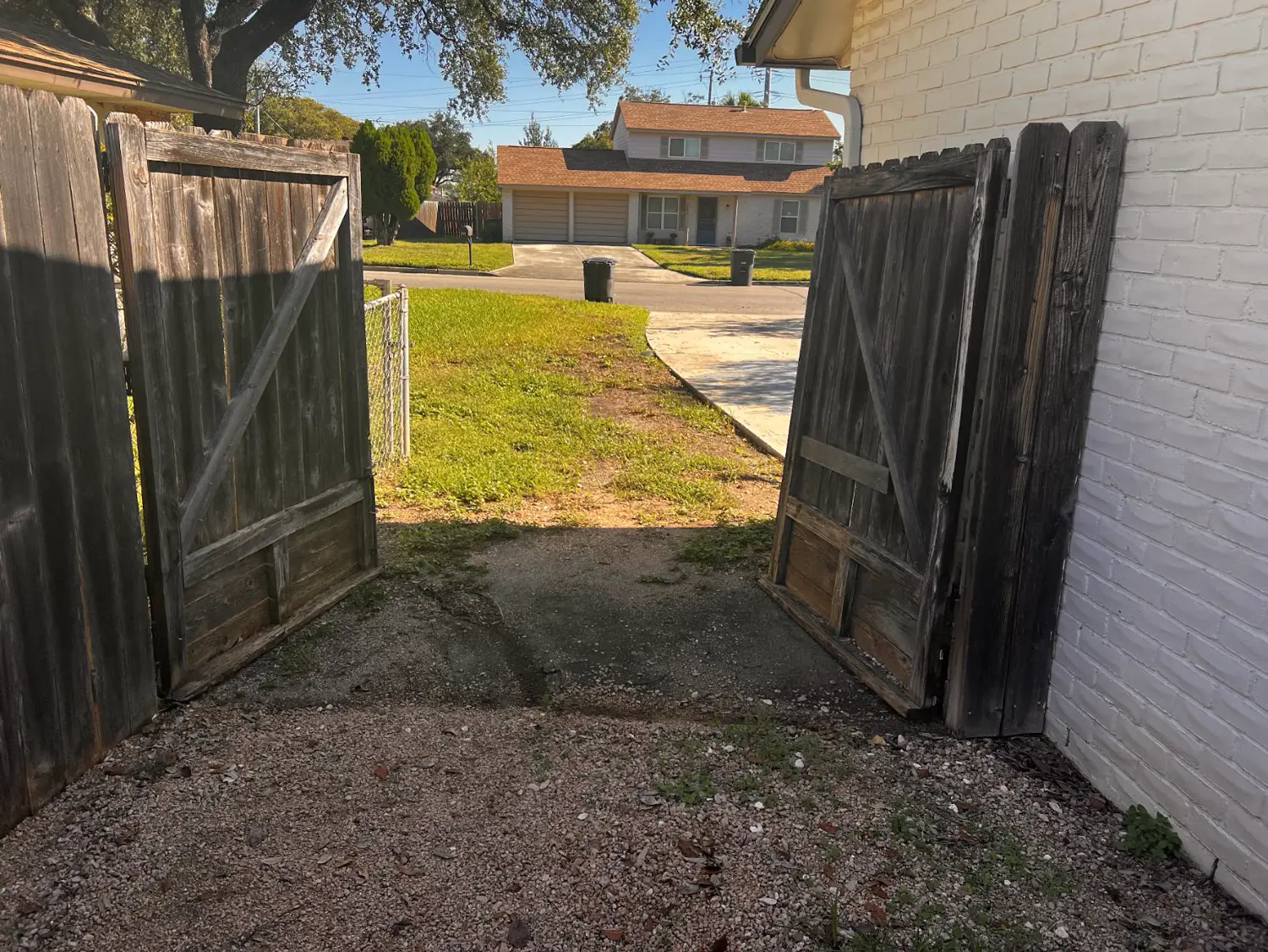Old driveway gates open before replacement