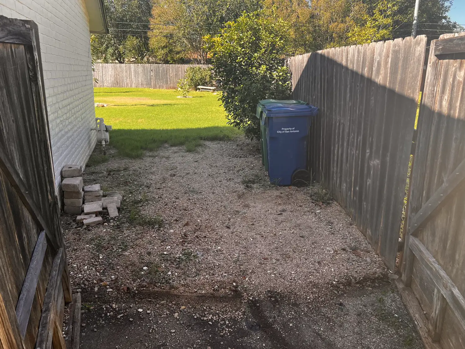 Old side fence before the privacy fence and gate